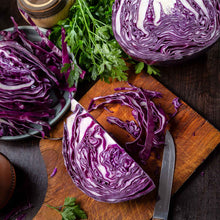 Red Express cabbage sliced and shredded showcasing its vibrant red and white coloring.